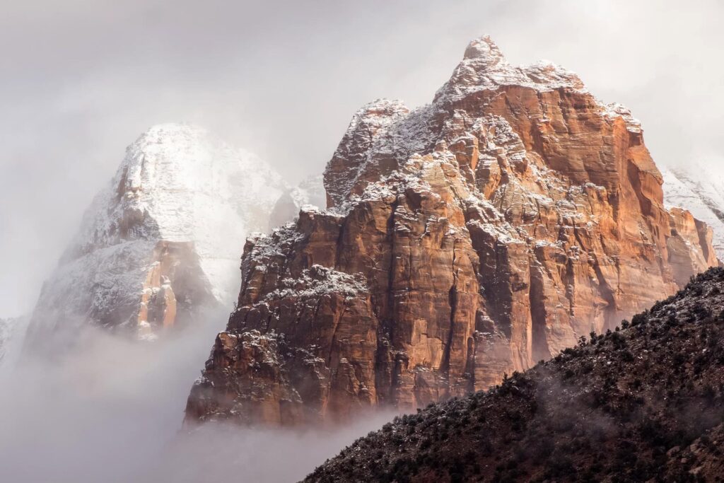 A majestic mountain in Zion National Park symbolizes strength and stability, reflecting Arex Advisors' expertise and reliable support in the ever-changing regulatory landscape. We help propel your global projects forward.