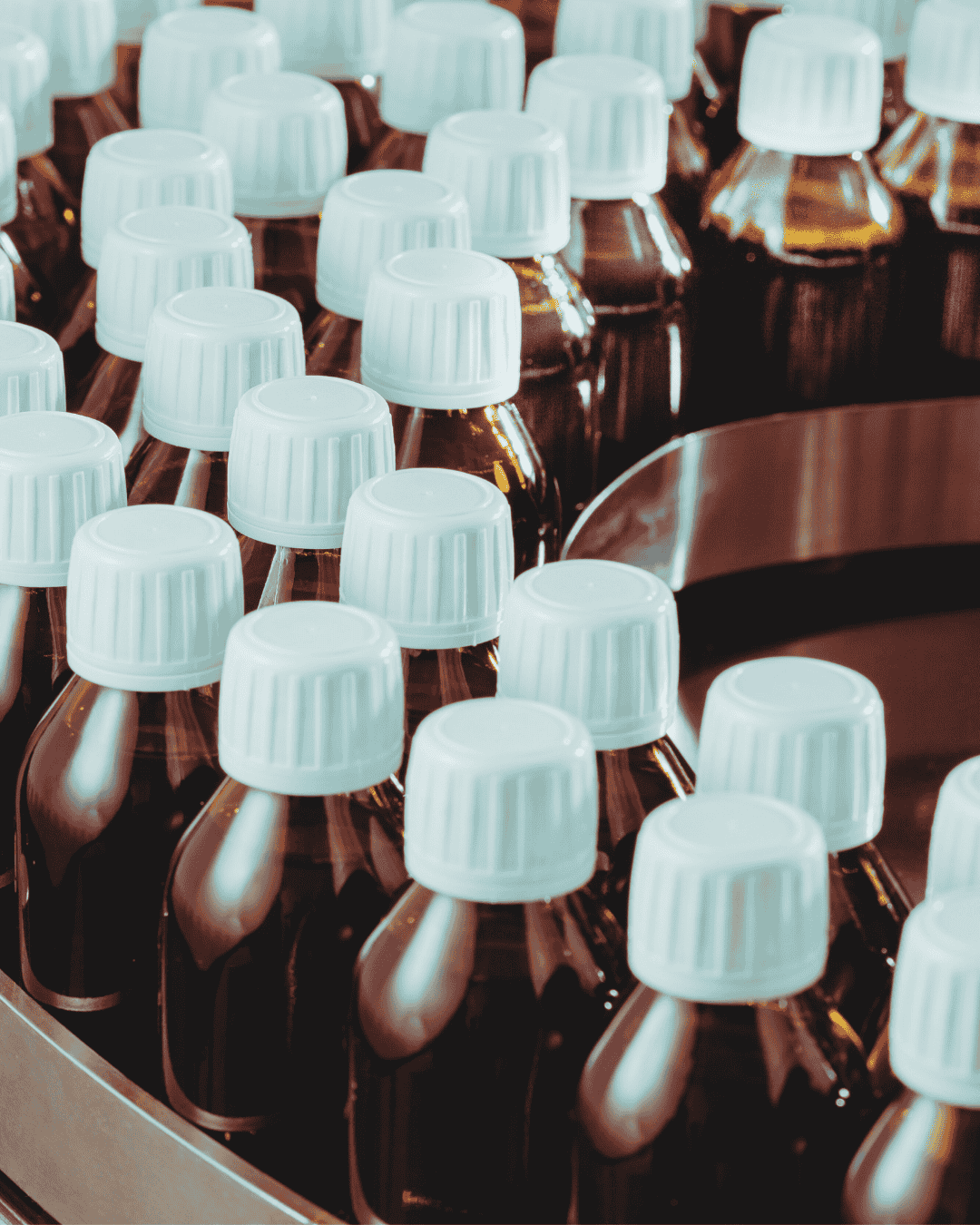 Medicines bottles being manufactured